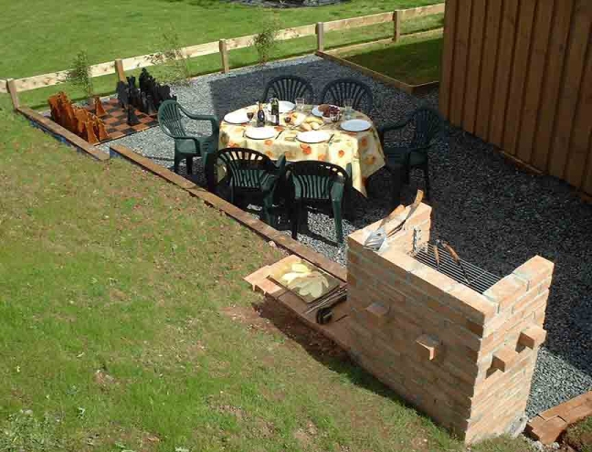 Click to see an enlarged view of the barbecue/chess area.